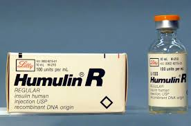 Фото, що показує упаковку Humulin R з флаконом поруч з ним.