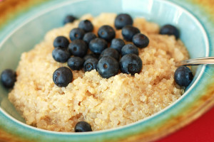 Bowl of quinoa topped with blueberries