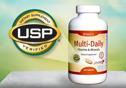 A picture of a multi daily vitamin and mineral supplement that contains the USP mark. This mark is then magnified so it can be viewed in more detail. The seal states, "Dietary Supplement USP Verified."
