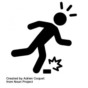 A silhouette of a person tripping over an object and falling