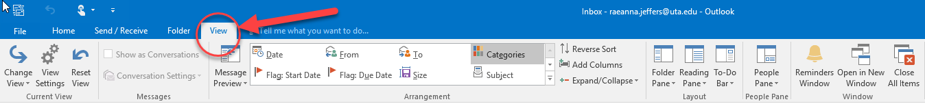 Screenshot of a Microsoft Outlook inbox; the View Settings button is highlighted with a red arrow. The toolbar includes options like New Email, Delete, and Reply.