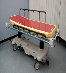 Slider board (red) on a stretcher