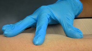 Holding skin taut prior to injection