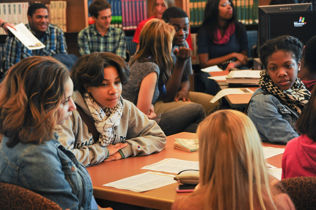 Young adults in the library.